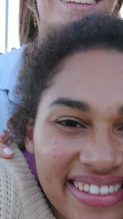 Close-up united portrait of young millennial teen students smiling at camera