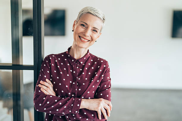 istock Confident Businesswoman in a Bright Office Setting 2211817699