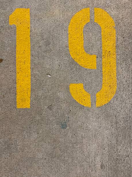 istock Number 19 stock photo, paint, parking space 2211820200