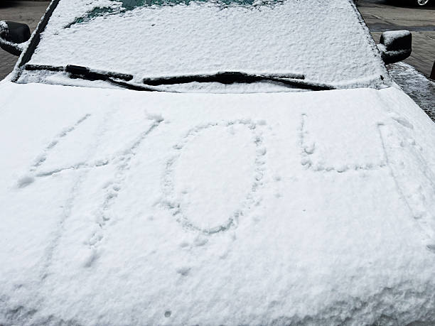 istock Snow-covered car with the number 404 drawn on the windshield 2211824072