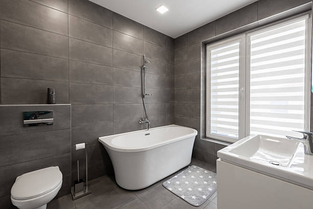 istock Modern Home Bathroom Interior With Minimalistic Design and Dark Gray Tile Finish 2211825332