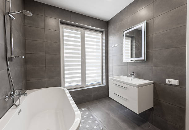 istock Modern Home Bathroom Interior With Minimalistic Design and Dark Gray Tile Finish 2211825349