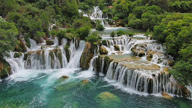 istock Krka Waterfalls with turquoise water 2211829520