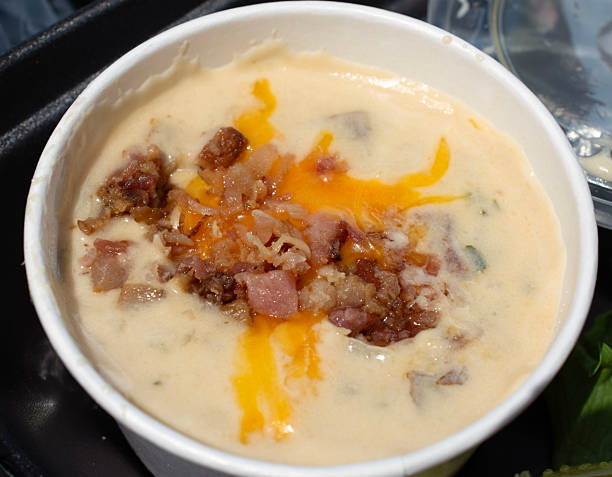 Close up of a cup of potato soup.