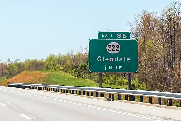 istock Highway Exit Sign to Enter Glendale, Hardin County, Kentucky, USA in Springtime 2211840935
