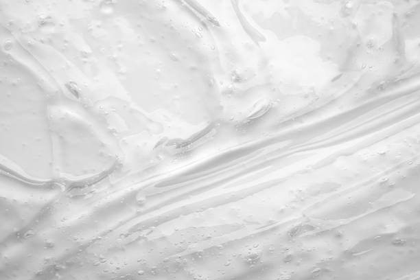 istock Transparent clear liquid serum gel cosmetic texture background 2211842896