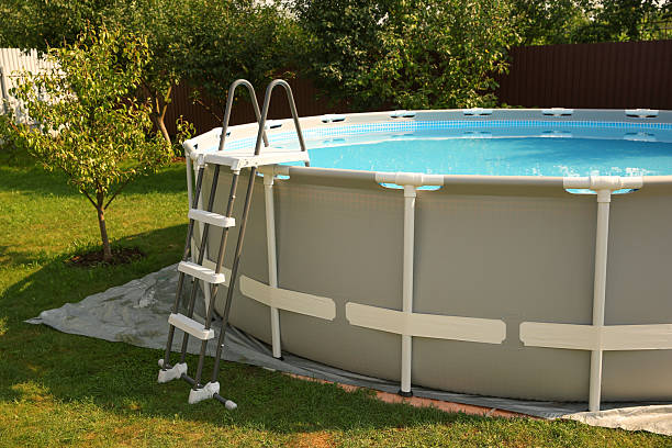 istock Above ground swimming pool outdoors on sunny day 2211845488
