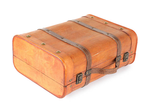 istock One new wooden suitcase isolated on white 2211845701