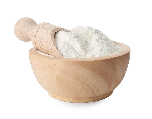 istock Baking powder in bowl and scoop isolated on white 2211845922