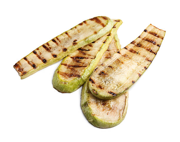 istock Tasty grilled zucchini slices isolated on white 2211846012