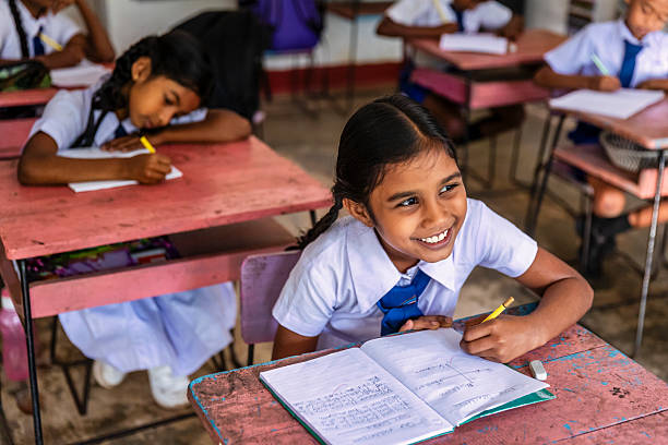 Sri Lankan school children in classroom, Sigiriya, Ceylon.