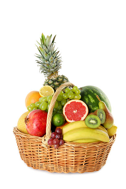 istock Many different fresh fruits in wicker basket isolated on white 2211846805
