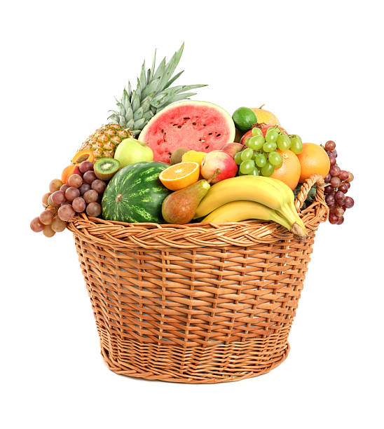 istock Many different fresh fruits in wicker basket isolated on white 2211846813