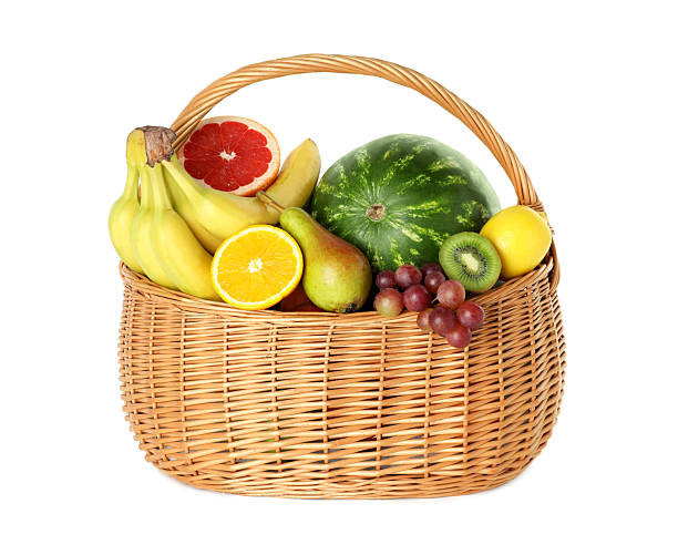 istock Many different fresh fruits in wicker basket isolated on white 2211846815
