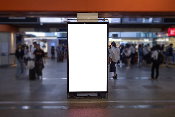 istock Blank advertising billboard with white in public, Empty white screen panel, sign board for advertisement. Frame wall media display public, mock up clipping path. 2211847045