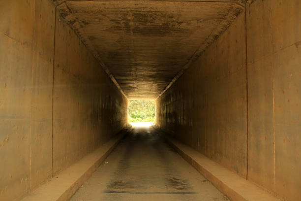 istock Light at the end of the tunnel. 2211848124
