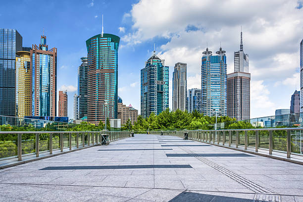 istock Stunning Urban Skyline with Modern Architecture and Lush Greenery in the Foreground 2211867921