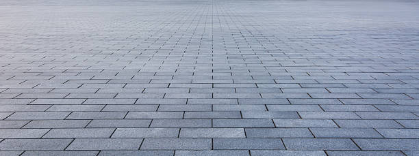 istock Captivating Patterns of Sleek Tiled Pavement in Serene Gray Tones 2211867941