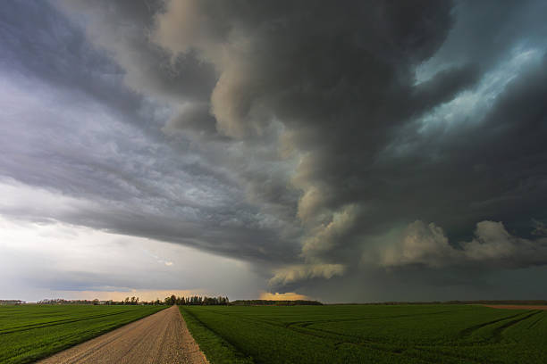 istock Dark storm rolling through the fields in Lithuania, dark supercell storm clouds 2211868508