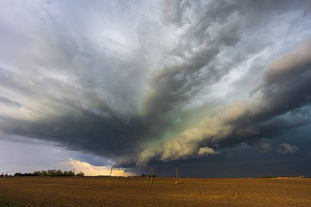 istock Dramatic storm clouds in the sky, dark severe storm clouds, supercell. 2211868567