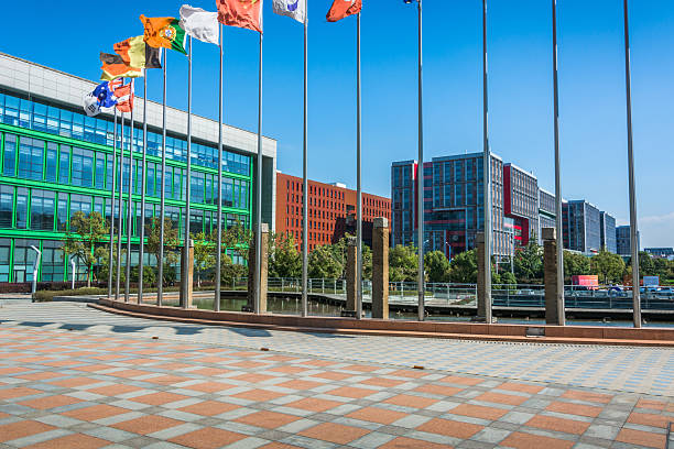 Vibrant Urban Scene Featuring Flags and Modern Architectural Designs