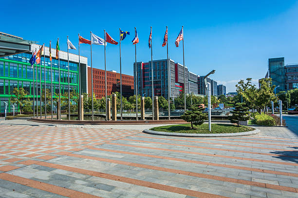 istock Vibrant Urban Landscape with Flags and Modern Architectural Design 2211869132