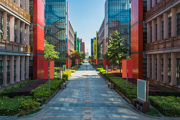 istock Vibrant Modern Architecture: A Scenic Pathway Through Colorful Buildings 2211869136