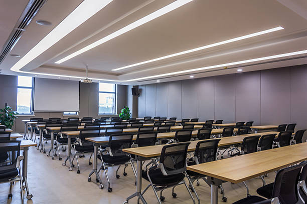 istock Modern Conference Room Setup with Ample Seating and Natural Light 2211869172