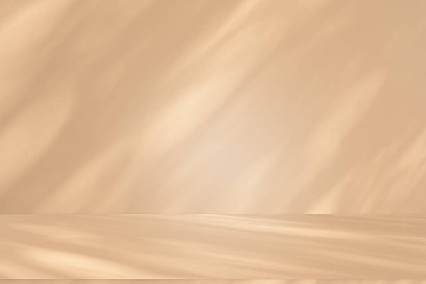 istock Studio style background wall decoration presentation uses white and beige tones. with shadows cast from a nearby window, concept creating a decorative 2211870861