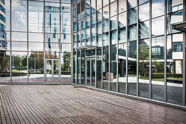 istock Captivating Modern Glass Architecture with Reflections and Natural Light 2211875276
