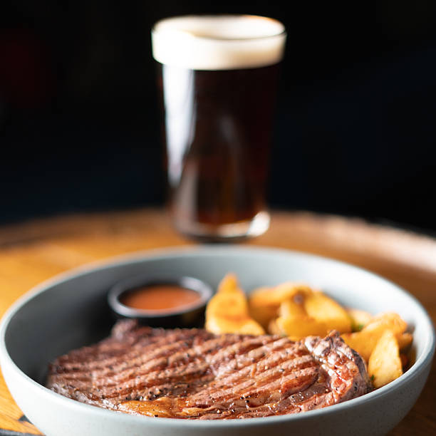 istock Savory Grilled Steak and Fries Plate 2211878333
