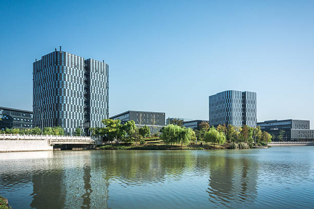 istock Breathtaking Modern Architecture Reflected in a Serene Urban Lake Landscape 2211878393