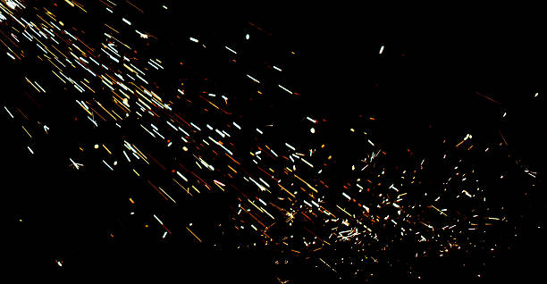 istock A black background with a lot of sparks and fire 2211880123