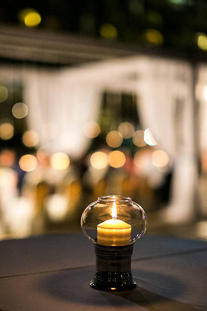 istock Luxury Glasses and candles at sunset 2211880227