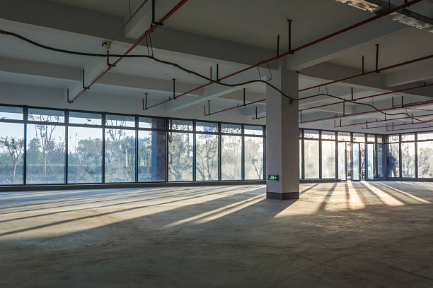 istock Spacious Empty Commercial Space with Natural Light and Modern Aesthetics 2211880514