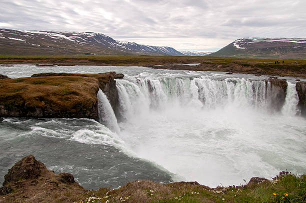 Godafoss waterfall is in northern Iceland. It is located along the country's main ring road. The water of the river Skjalfandafljot falls from a height of 12 metres over a width of 30 metres.