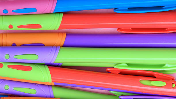 istock many Ball Pen on Pink Background 2211884229