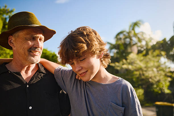istock Father and son sharing a moment of affection in australia 2211884958