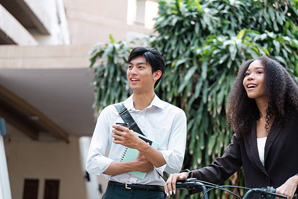 istock Sustainable Innovation and Social Connectivity. Friends explore eco-conscious solutions while sharing ideas outdoors. 2211889315