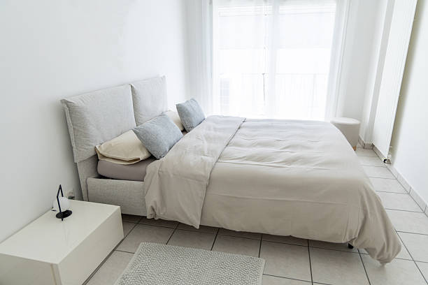 istock Modern Minimalist Bedroom with Natural Light 2211892144