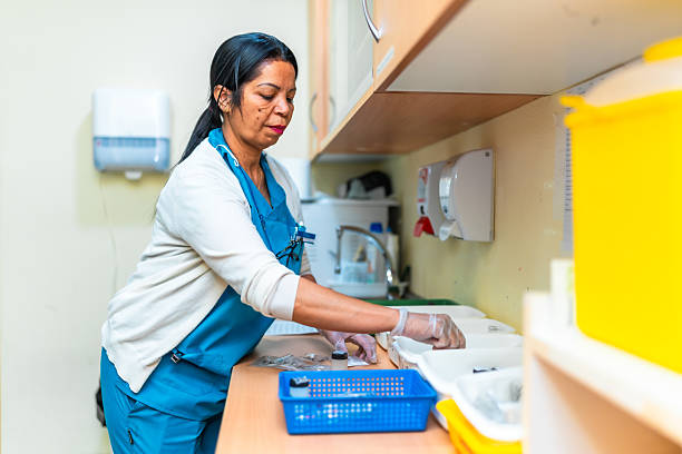 istock Nurse preparing medication in nursing home treatment room 2211892847