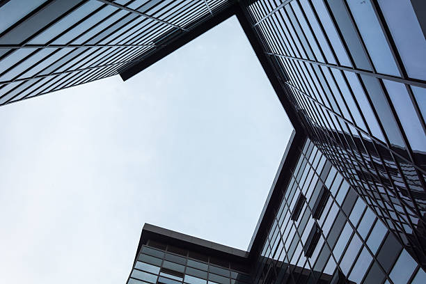 istock Captivating Perspective of Modern Architecture Reaching for the Sky 2211893126