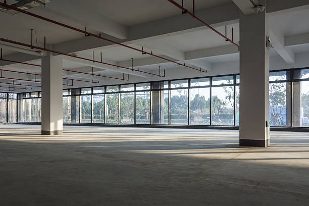istock Expansive Empty Indoor Space with Abundant Natural Light and Modern Architecture 2211893177