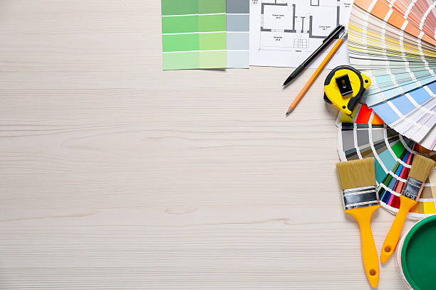 istock Flat lay composition with different painter's tools on white wooden table, space for text. Decorating and design 2211895336