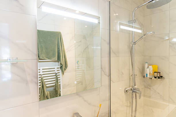 istock Modern Bathroom with Marble Sink and Towel Reflection 2211896861
