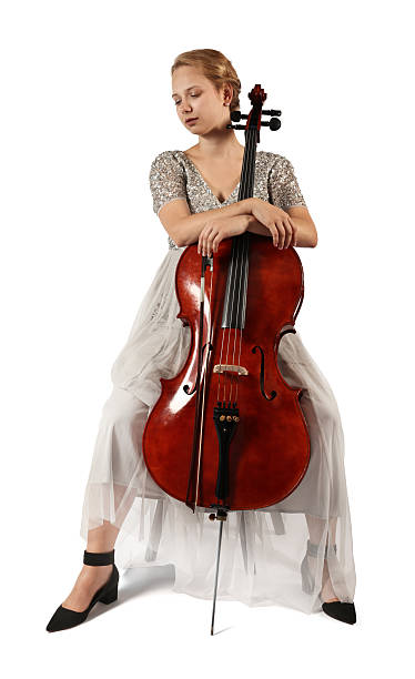 istock Beautiful young woman with cello isolated on white 2211897206