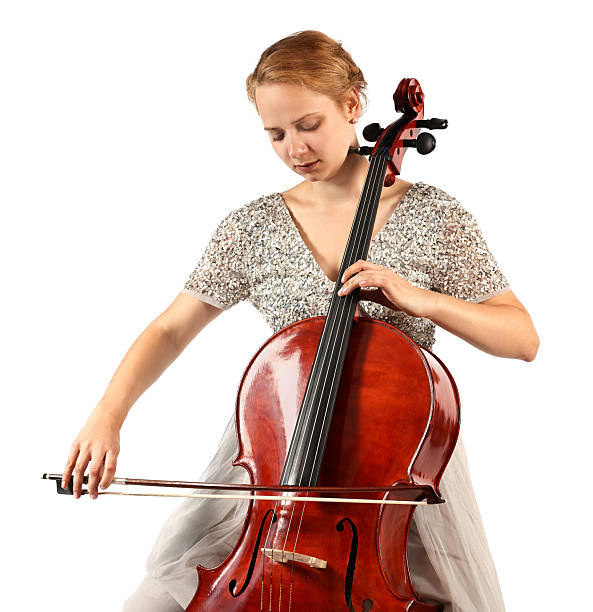 istock Beautiful young woman playing cello on white background 2211897273