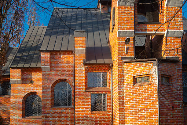 istock brick facade of an old church in sunlight 2211897707
