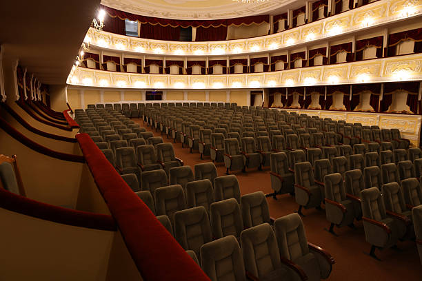 istock Rows of gray comfortable seats in theatre 2211899127