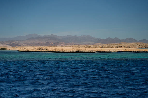 istock A beautiful serene seascape featuring majestic mountains elegantly positioned in the background 2211900447